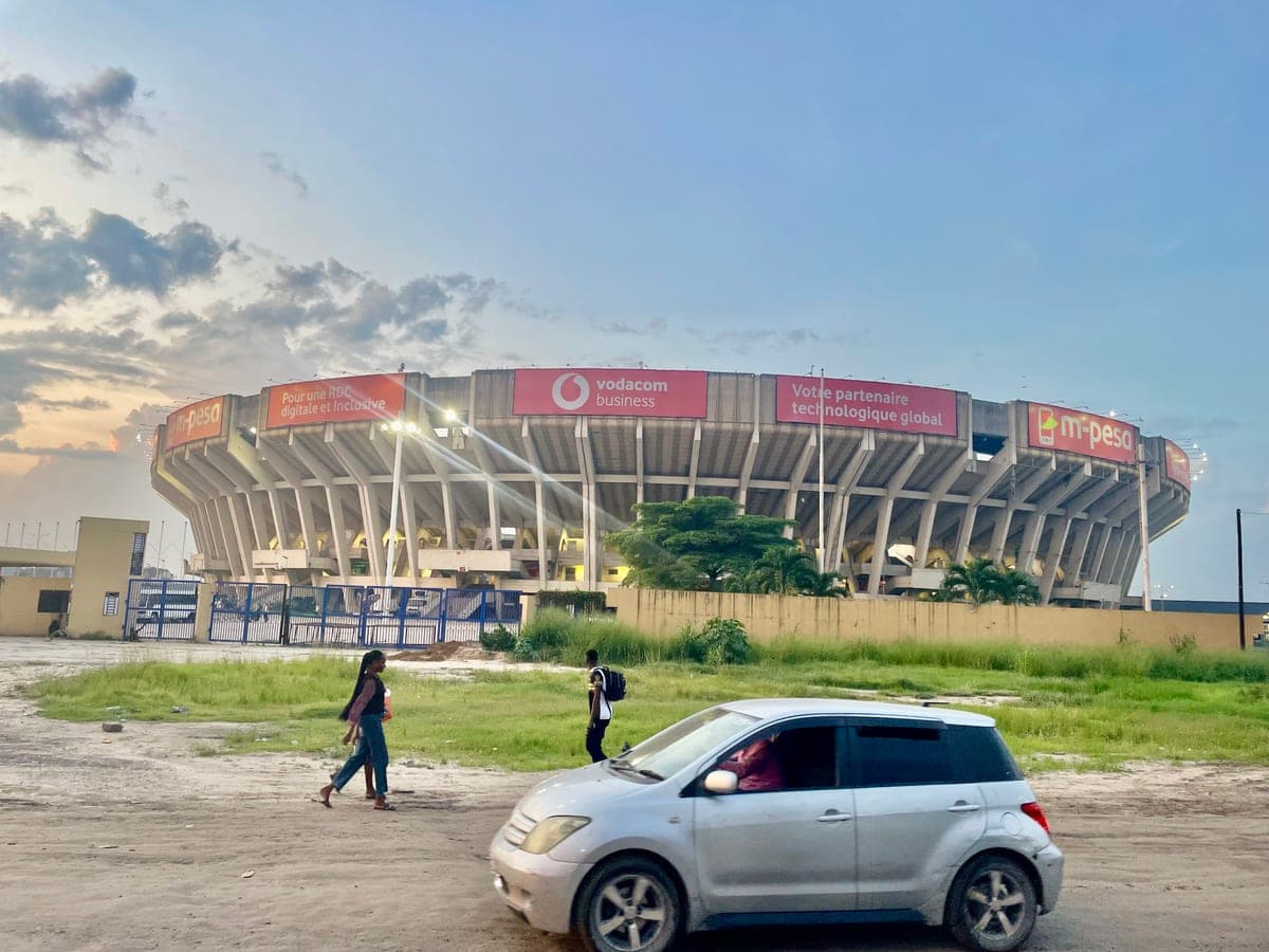 Archive, 7 May 2025: exterior of Stade des Martyrs in Kinshasa beneath an evening sky.